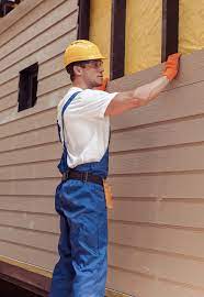 How To Choose The Right Materials for Your Siding Installation in 'Elwood, IN